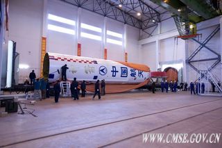 Carrier Rocket for Shenzhou 9 Spaceship Arrives at Launch Center