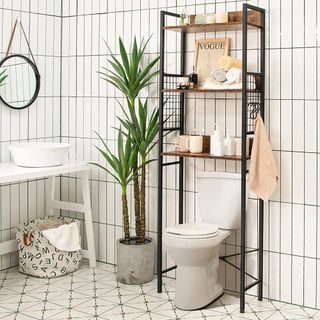Modern-industrial over toilet shelf ladder styled with toiletries