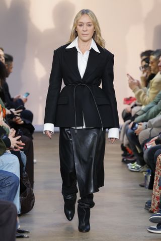 Chloe Sevigny on Proenza Schoulder runway in black jacket