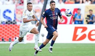 Achraf Hakimi right-back of PSG and Morocco and Kylian Mbappe centre-forward of Real Madrid and France compete for the ball during the FIFA Club World Cup 2025 semi-final match between Paris Saint-Germain and Real Madrid CF at MetLife Stadium on July 9, 2025 in East Rutherford, United States (Photo by Jose Breton/Pics Action/NurPhoto via Getty Images)