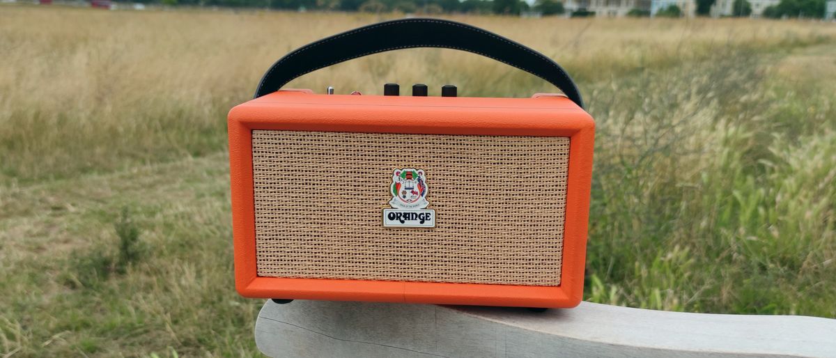 A front view of the Orange Box on a bench