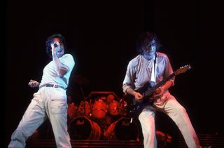 From left, the Firm's Paul Rodgers, Chris Slade and Jimmy Page perform at the Milwaukee Arena on March 7, 1985.
