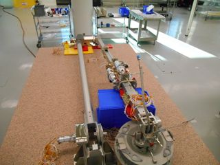 Arm's-length approach. The Touch-And-Go Sample Acquisition Mechanism (TAGSAM) for NASA's OSIRIS-REx asteroid sample-return mission.