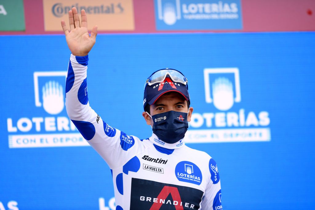 EJEADELOSCABALLEROS SPAIN OCTOBER 23 Podium Richard Carapaz of Ecuador and Team INEOS Grenadiers Polka Dot Mountain Jersey Celebration Mask Covid safety measures during the 75th Tour of Spain 2020 Stage 4 a 1917km stage from Garray Numancia to Ejea de los Caballeros lavuelta LaVuelta20 La Vuelta on October 23 2020 in Ejea de los Caballeros Spain Photo by David RamosGetty Images
