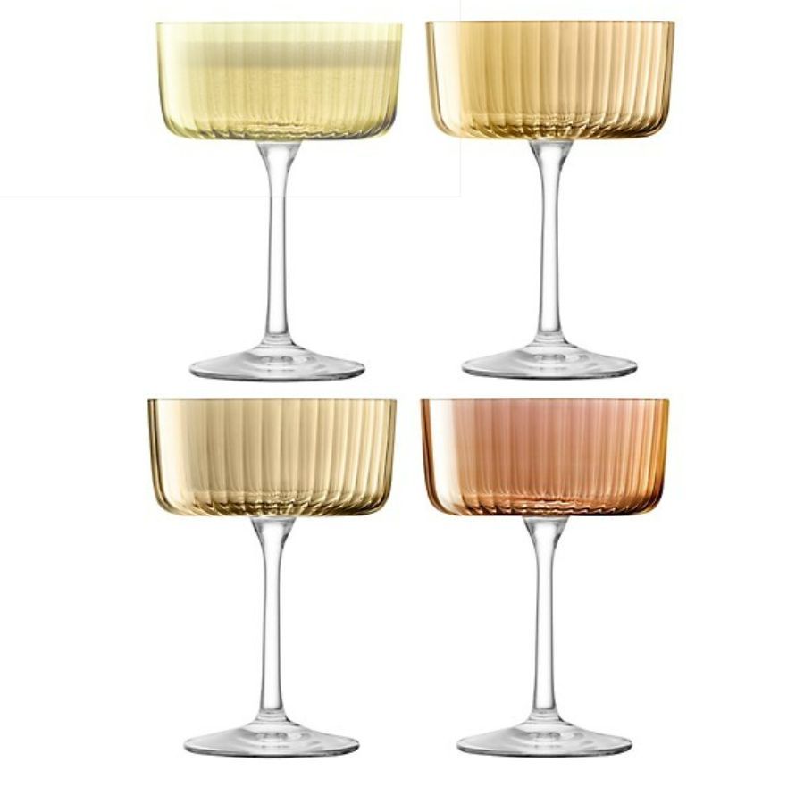 A set of four amber champagne flutes