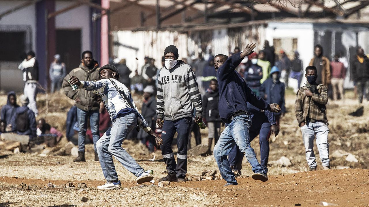 Protesters throwing stones