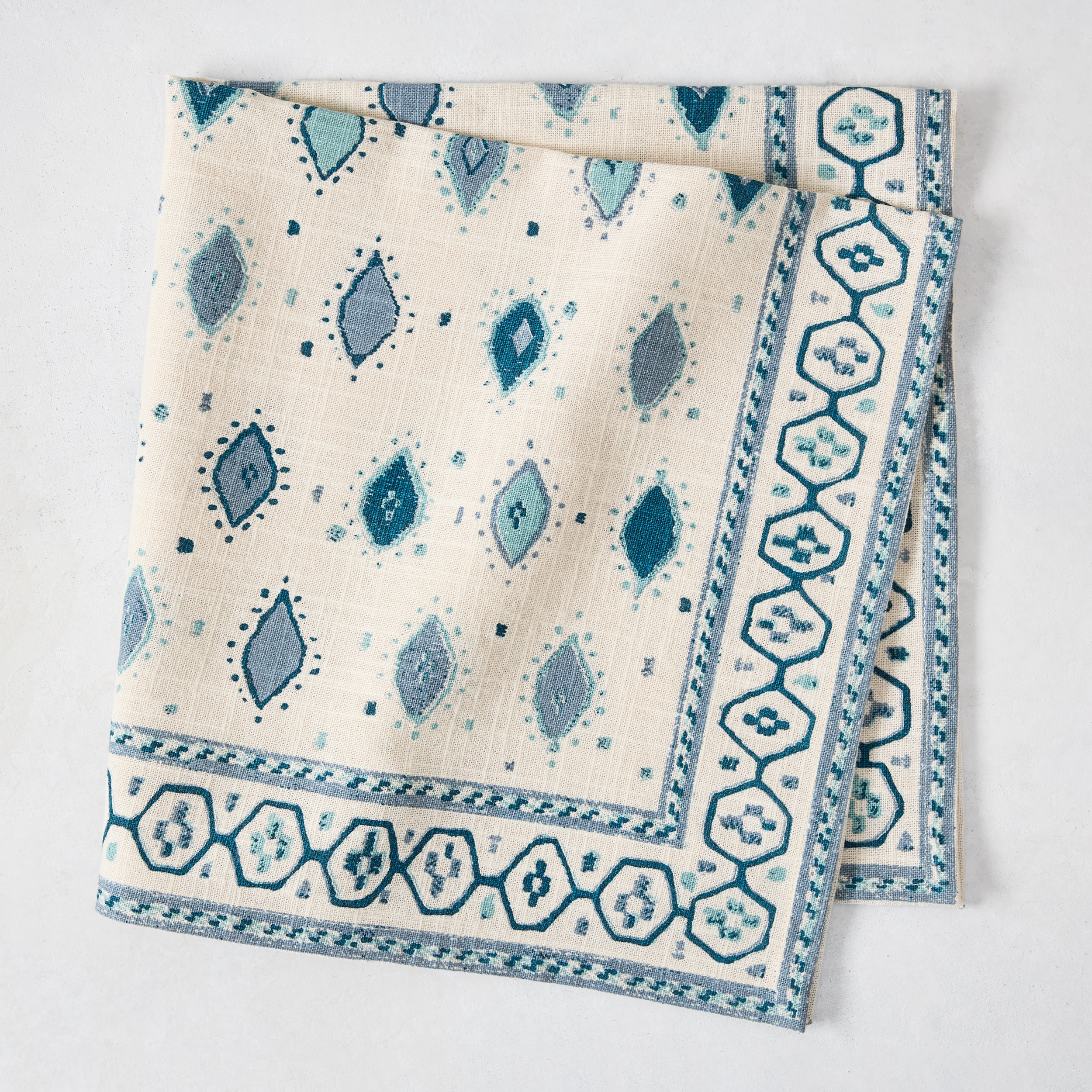 Blue and white patterned napkin