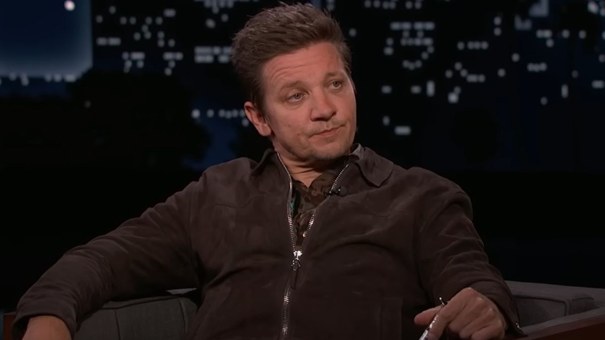  A screenshot of Jeremy Renner on Jimmy Kimmel Live holding a cane.