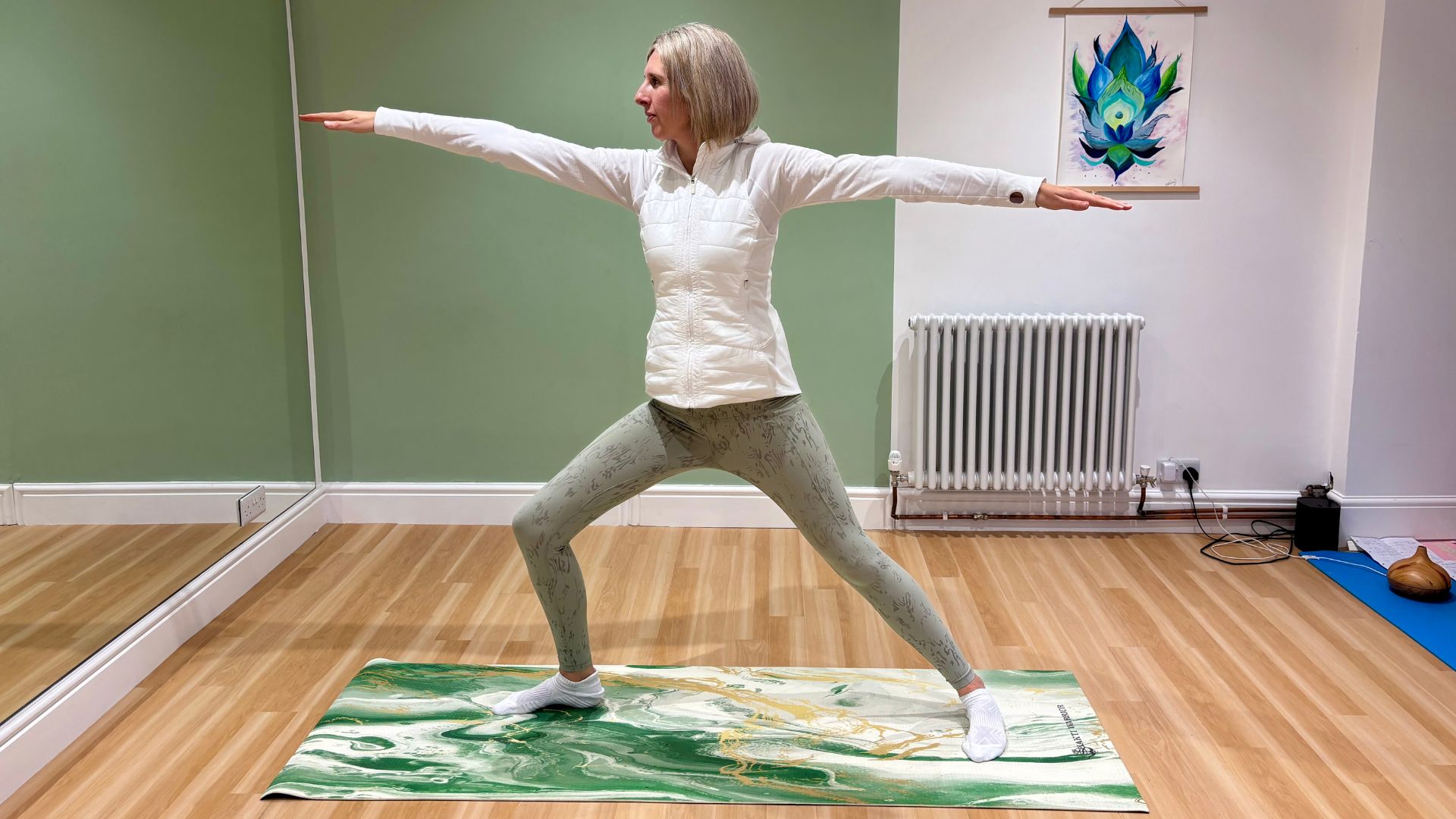 Kathryn Williams standing on yoga mat