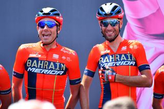 Bahrain-Merida's Damiano Caruso shares a joke with team leader Vincenzo Nibali ahead of stage 12 of the 2019 Giro d'Italia