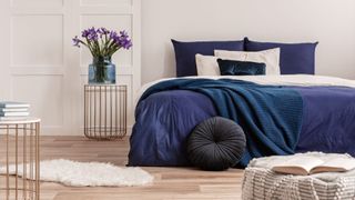 The three colours you should avoid using in your bedroom if you want a restful nights sleep - picture of bed with blue colours