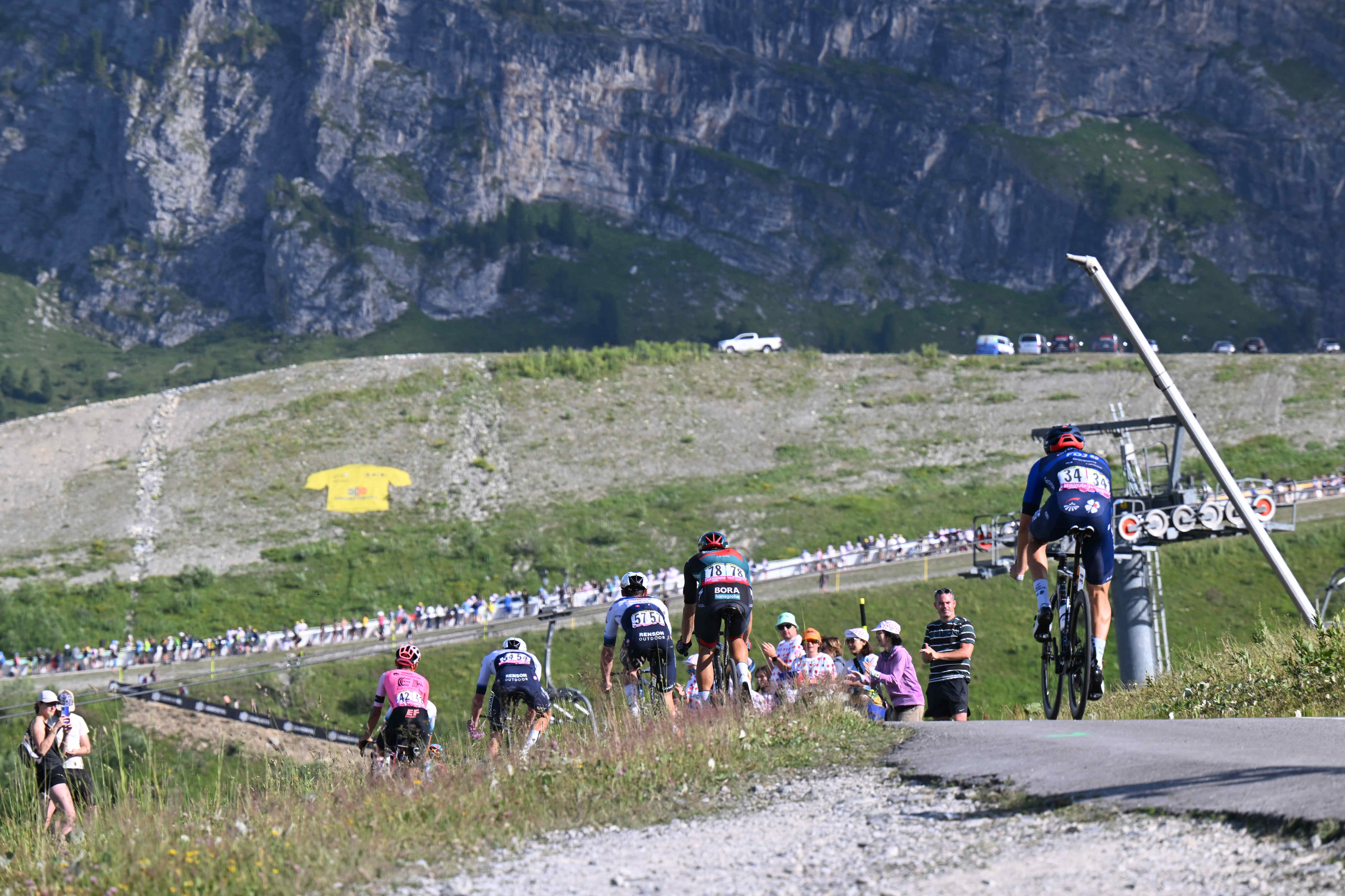 A cyclist on the steep and winding road of the Col de la Loze during Stage 17 of the 2023 Tour de France, which ran from Saint-Gervais Mont-Blanc to Courchevel.
