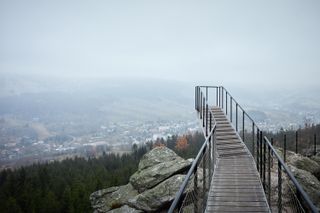 The Fox mountain viewpoint structure jutting out above valley, by Mjölk Architects