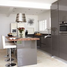 kitchen with refrigerator and kitchen worktop