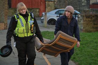 a still of Alison and Catherine carrying furniture in Happy Valley season 3