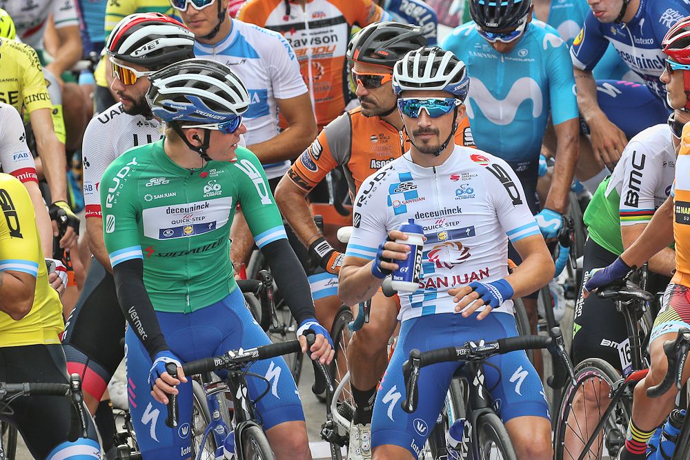 remco Evenepoel and Julian Alaphlippe wait for the start of stage 5 in San Juan