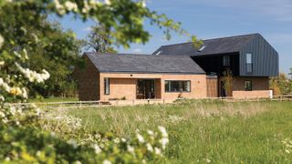 contemporary self build with black cladding