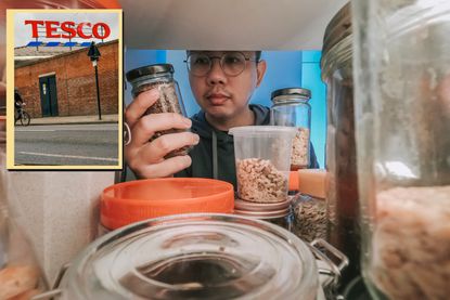 Man looking inside food cupboard main and drop in of Tesco store sign