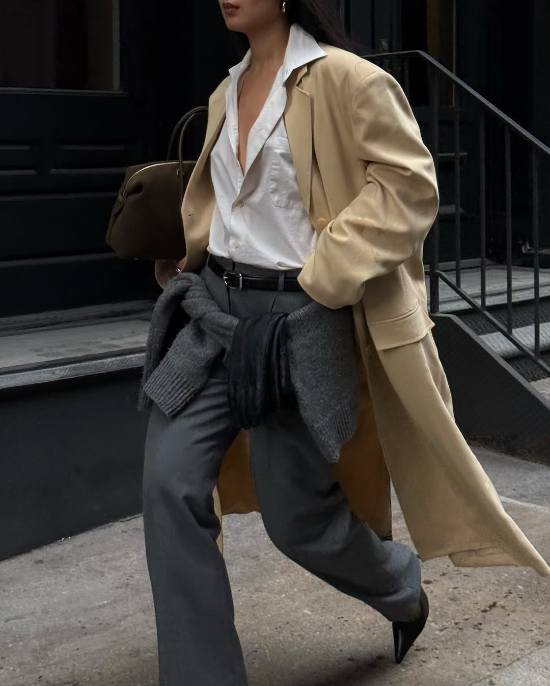 Woman wearing popular anti trend wardrobe items 2026.