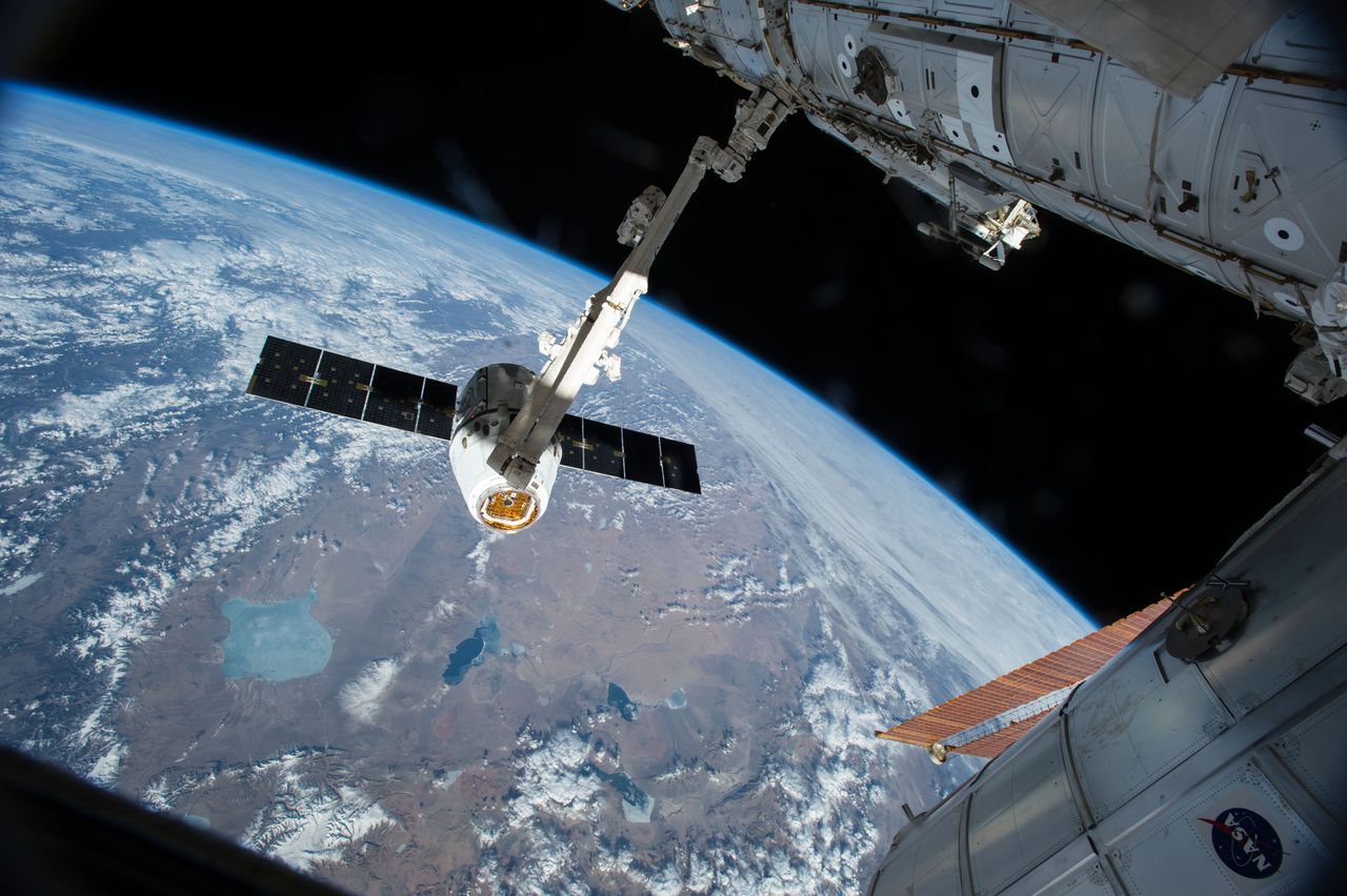 SpaceX Dragon cargo spacecraft attaches to the International Space Station.