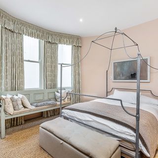 bedroom with calming shades and curtains