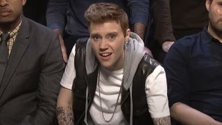 Kate McKinnon impersonating Justin Bieber on SNL