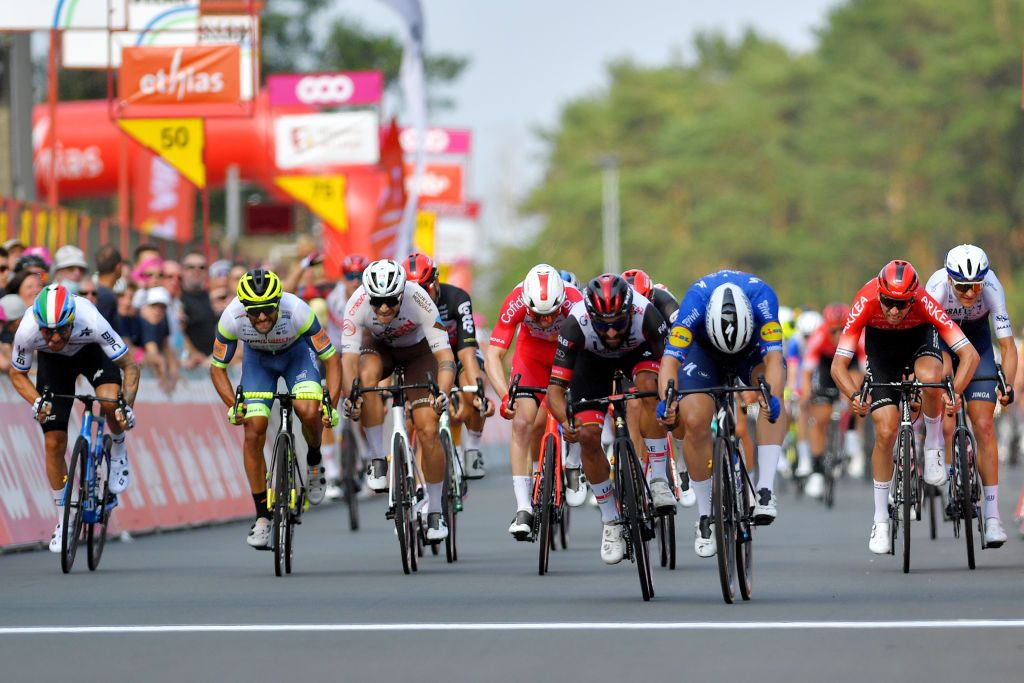 HEUSDENZOLDER BELGIUM JULY 21 Giacomo Nizzolo of Italy and Team Qhubeka Nexthash Andrea Pasqualon of Italy and Team Intermarch Wanty Gobert Matriaux Marc Sarreau of France and AG2R Citren Team Fernando Gaviria Rendon of Colombia and UAE Team Emirates Fabio Jakobsen of Netherlands and Team Deceuninck QuickStep Amaury Capiot of Belgium and Team Arka Samsic sprint at arrival during the 42nd Tour de Wallonie 2021 Stage 2 a 120km stage from Zolder Circuit to Zolder Circuit Race held at the Zolder Circuit due to flooding in the country tourdewallonie grandprixdewallonie on July 21 2021 in HeusdenZolder Belgium Photo by Luc ClaessenGetty Images