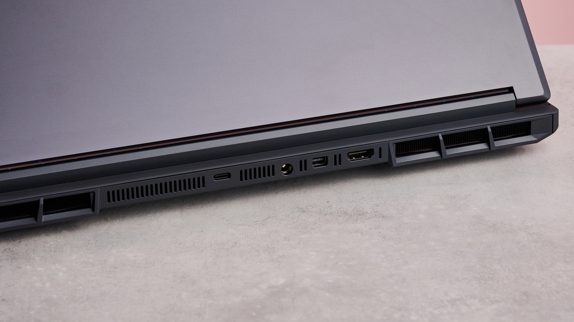 Close-up of rear ports on Medion Erazer Major 16 X1, on a desk