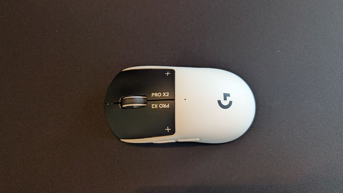 The Logitech G Pro X2 Superstrike pictured on a black mouse mat.