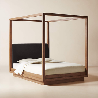 wooden canopy bedframe with upholstered headboard