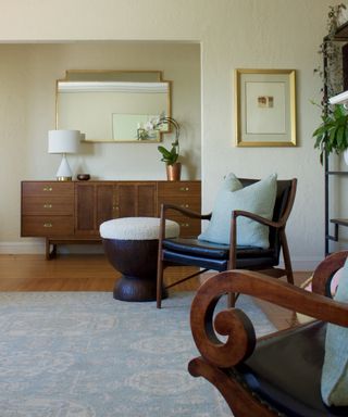 Living room with vintage armchairs and vintage sideboard