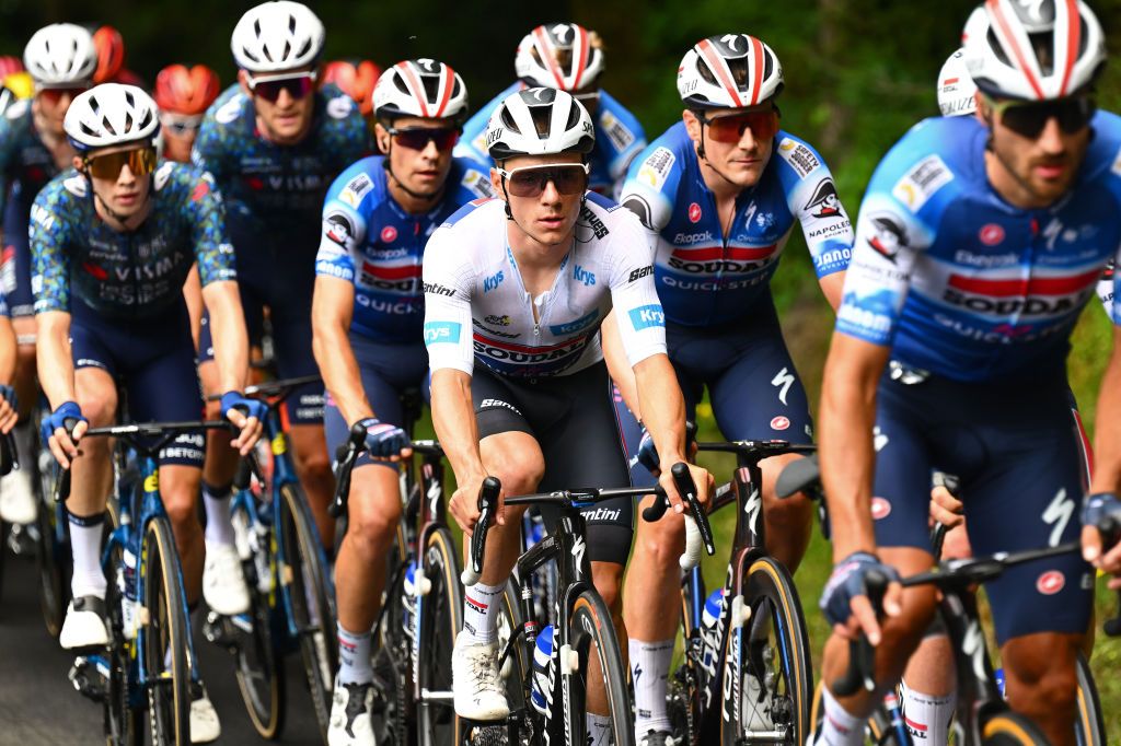 LELIORAN FRANCE JULY 10 LR Remco Evenepoel of Belgium White best young jersey and Louis Vervaeke of Belgium and Team Soudal QuickStep compete during the 111th Tour de France 2024 Stage 11 a 211km stage from EvauxlesBains to Le Lioran 1239m UCIWT on July 10 2024 in Le Lioran France Photo by Tim de WaeleGetty Images