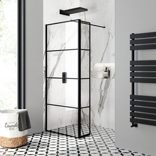 walk in shower with black glass shower screen