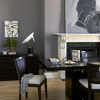 grey dining room with black dinning table and chair
