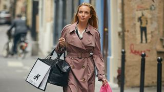 Jodie Comer wearing a trench coat.
