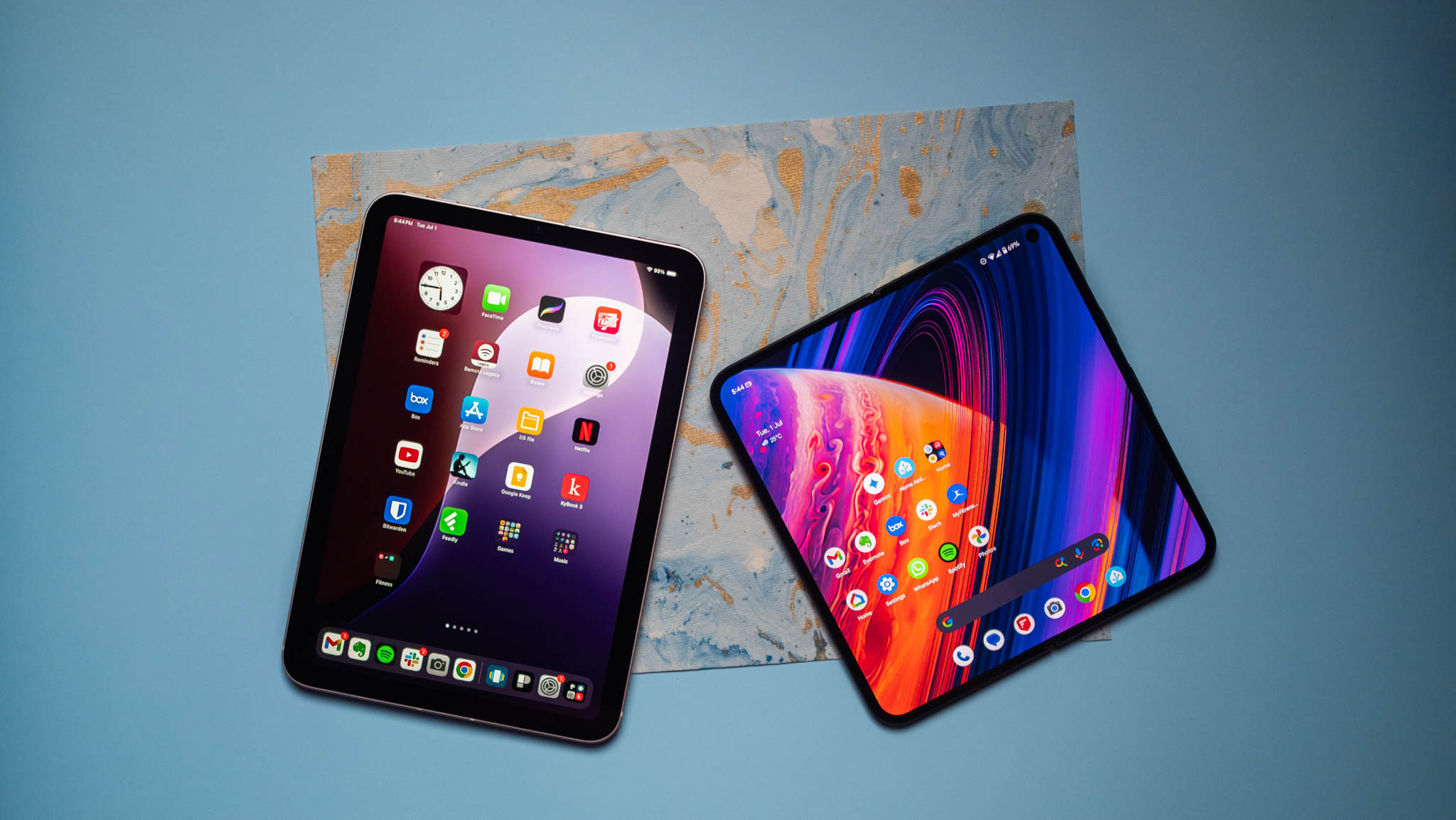 Apple iPad mini next to Pixel 9 Pro Fold
