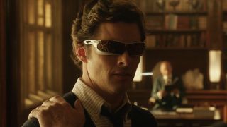 Cyclops with Wolverine's hand on his shoulder, with Professor X sitting in the background in X-Men Days of Future Past