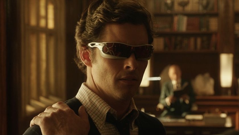 Cyclops with Wolverine's hand on his shoulder, with Professor X sitting in the background in X-Men Days of Future Past