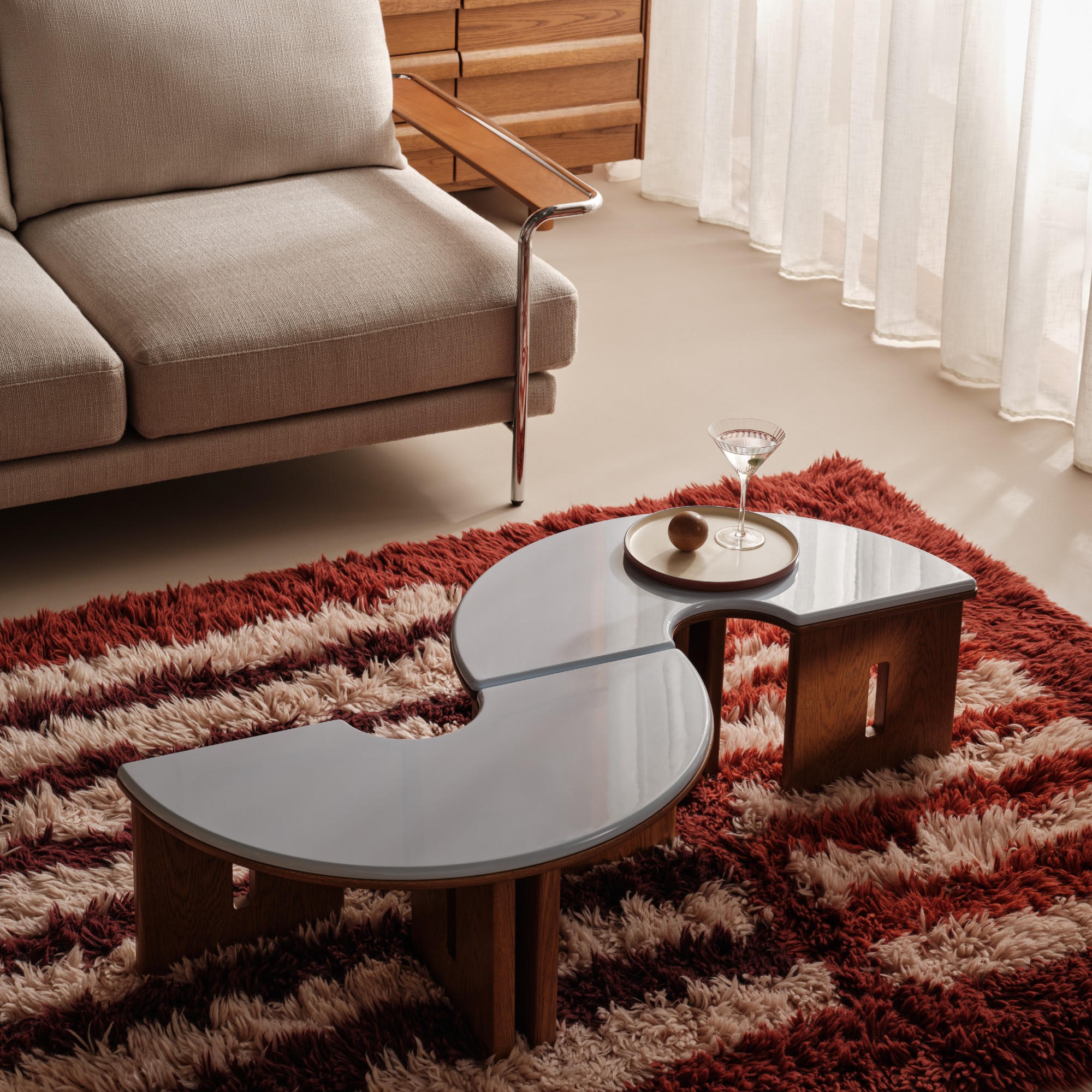 A living room at the Barbican furnished with pieces from the MADE x Barbican homeware collection including the Plinth coffee table arranged into an S shape