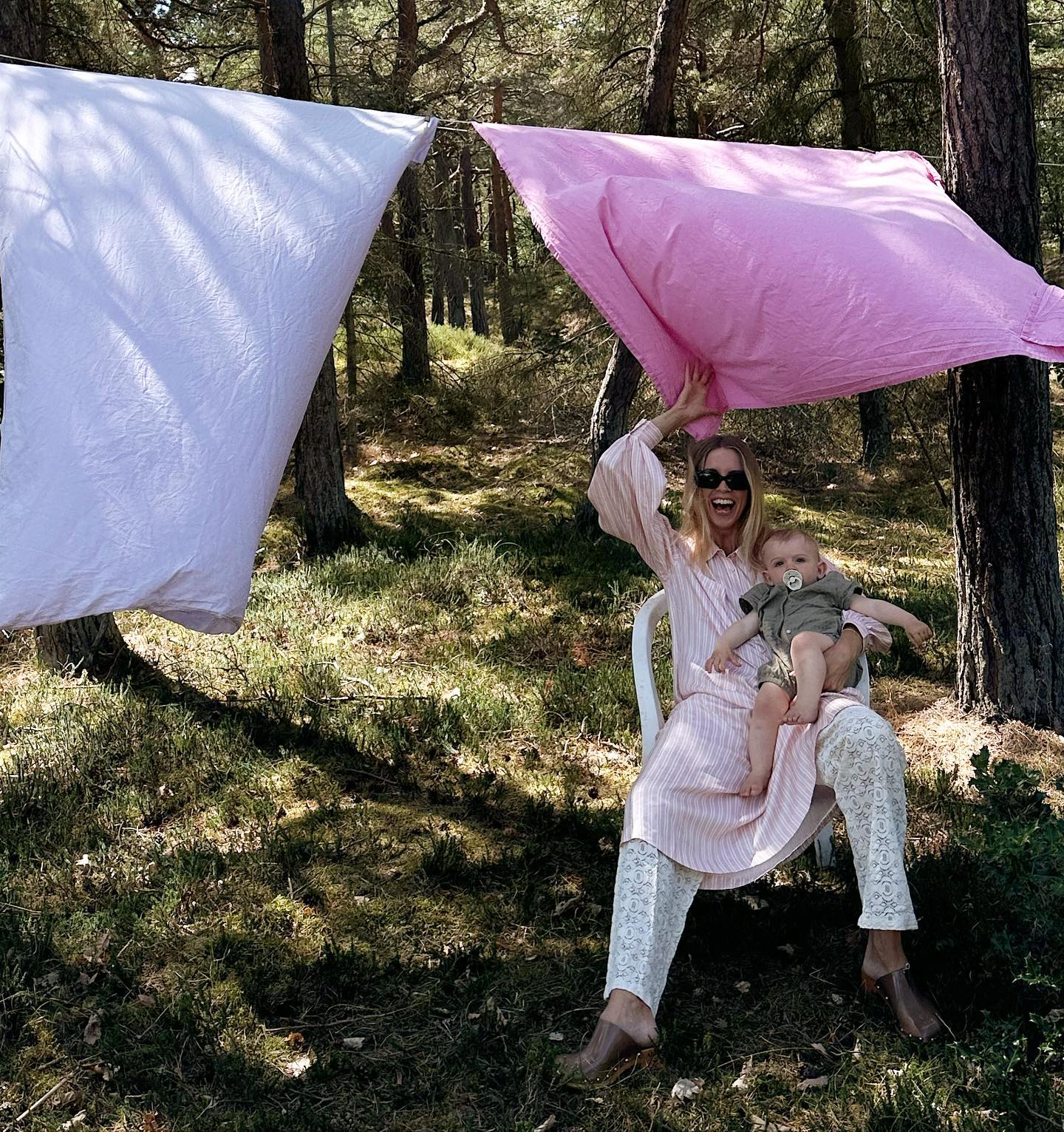 woman in a garden wearing stripes