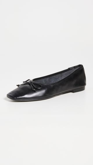 black ballet flats with a small bow