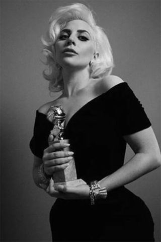 Lady Gaga Posing With Her Golden Globe 2016