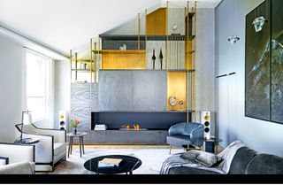 Tall contemporary living room with a statement grey and gold shelving unit