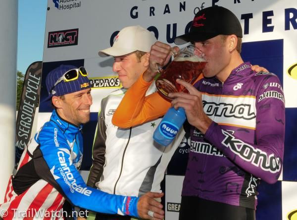 Tim Johnson, Jeremy Powers, Ryan Trebon (L to R) enjoy Great Brewers beer on the podium