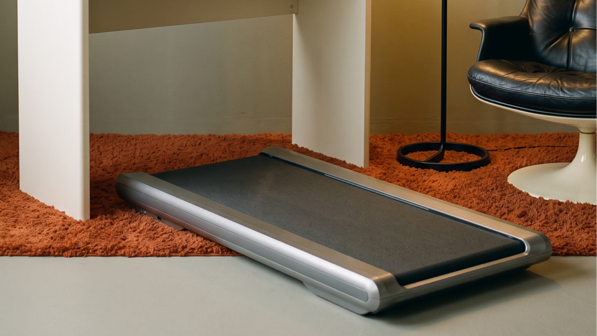 The Cyberpad 3 treadmill on an orange rug