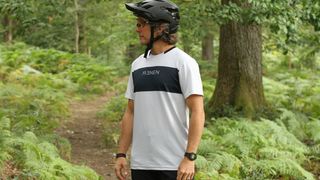 Renen Flow MTB jersey being worn by a model by a mtb trail