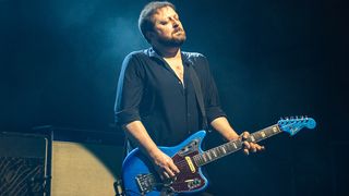 Richard Oakes of Suede performs onstage during a concert at Cambridge Corn Exchange on February 11, 2026 in Cambridge, Cambridgeshire