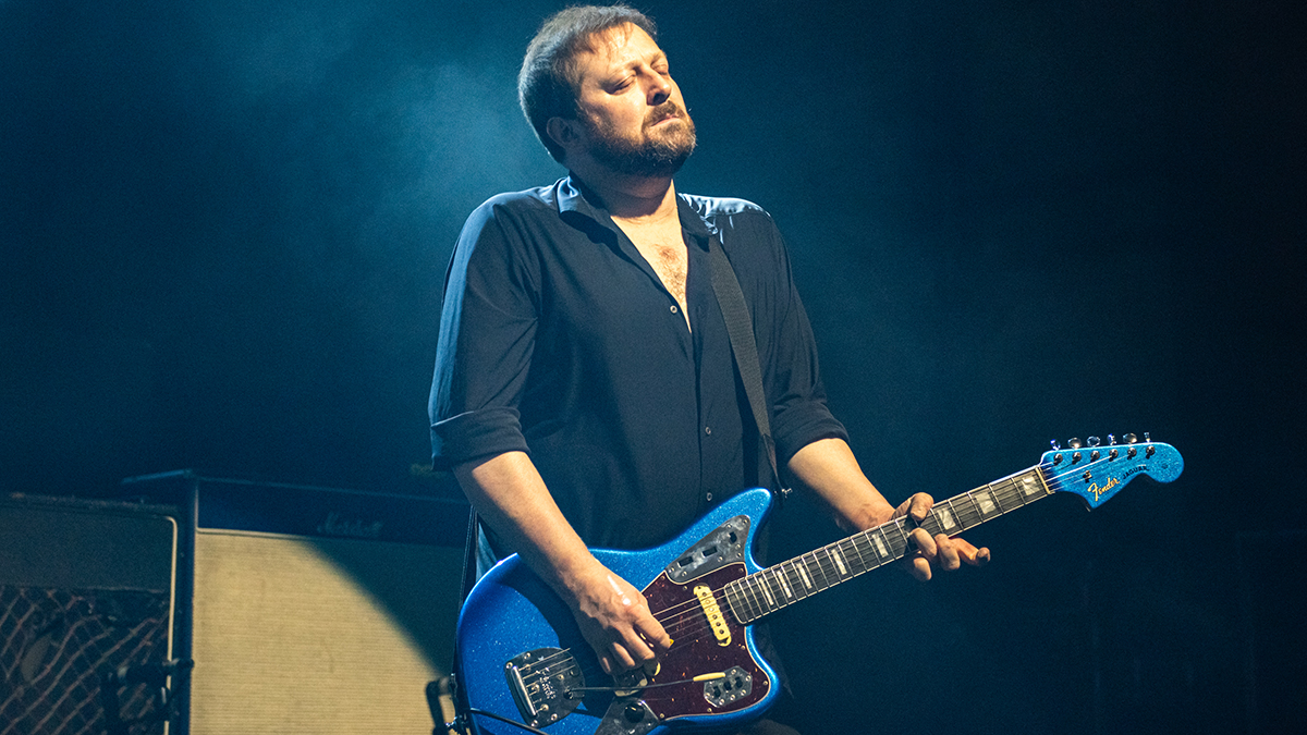 Richard Oakes of Suede performs onstage during a concert at Cambridge Corn Exchange on February 11, 2026 in Cambridge, Cambridgeshire