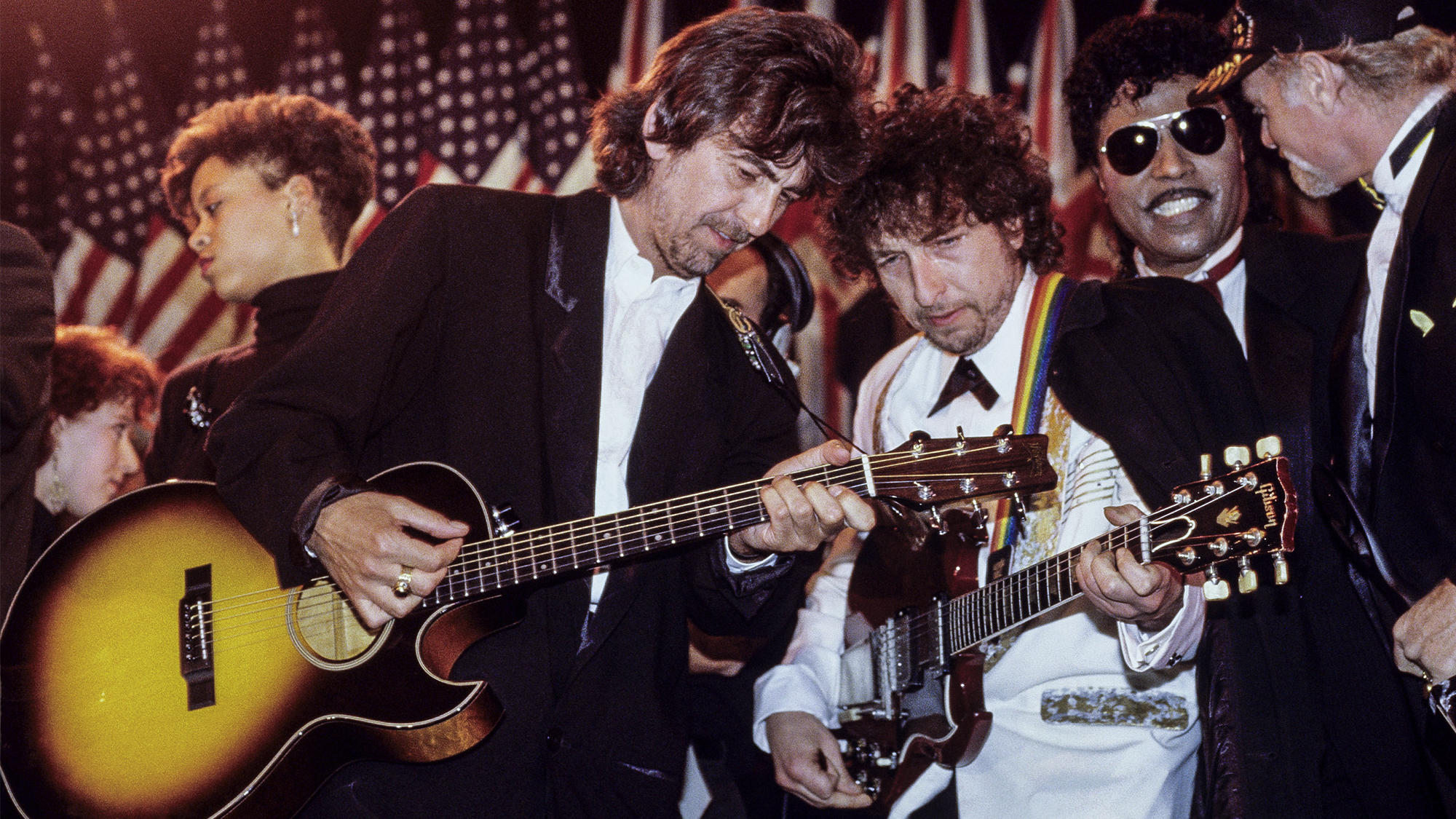 George Harrison, Bob Dylan, Little Richard and Mike Love of The Beach Boys performing at the 1988 Rock &amp; Roll Hall Of Fame awards ceremony at the Waldorf Astoria Hotel in New York City on January 20, 1988. 