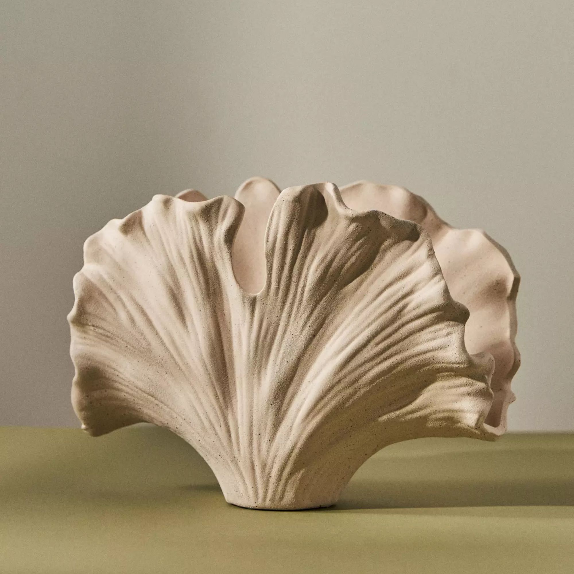 Ceramic leaf-shaped vase with a narrow base